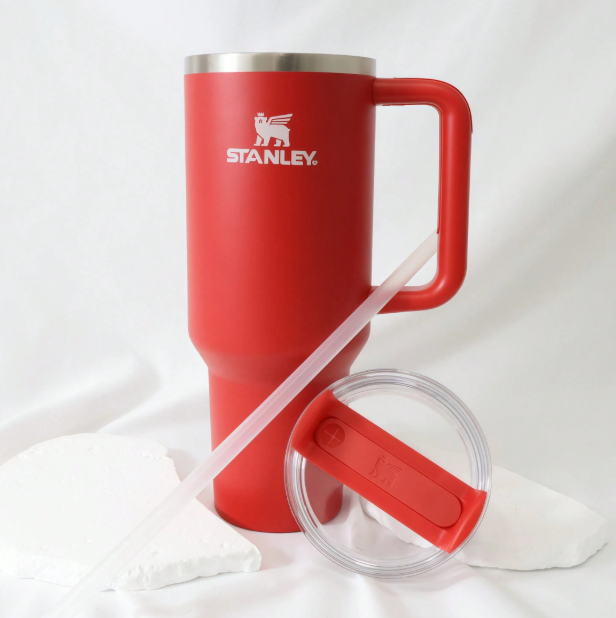 Stanley 40oz matte red travel tumbler with straw and lid detail