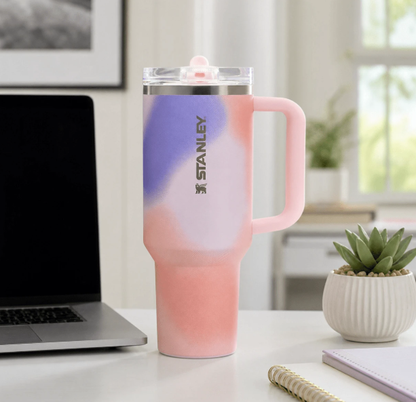 Stanley 40oz pink purple gradient tumbler on desk