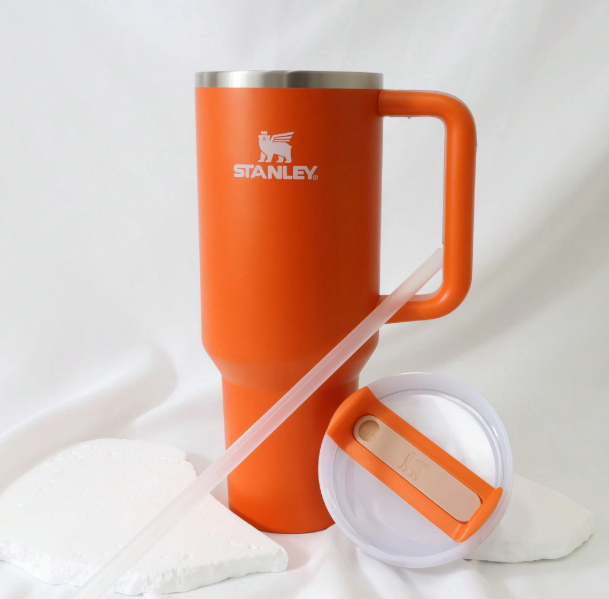 Stanley 40oz matte orange tumbler with straw and lid