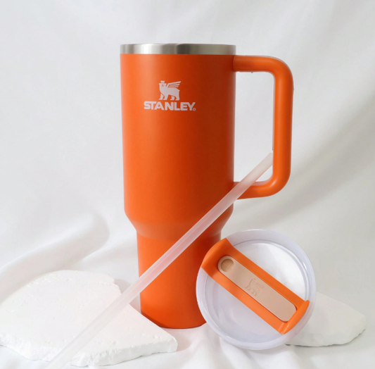 Stanley 40oz matte orange tumbler with straw and lid