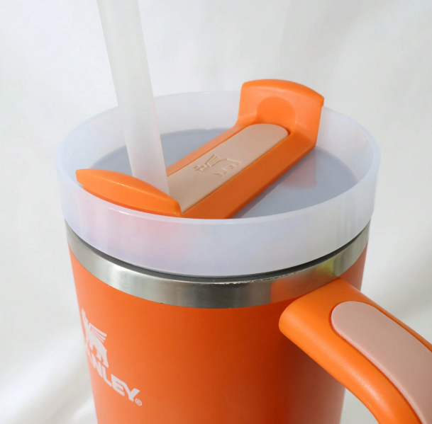 Stanley 40oz matte orange tumbler close-up of lid and handle