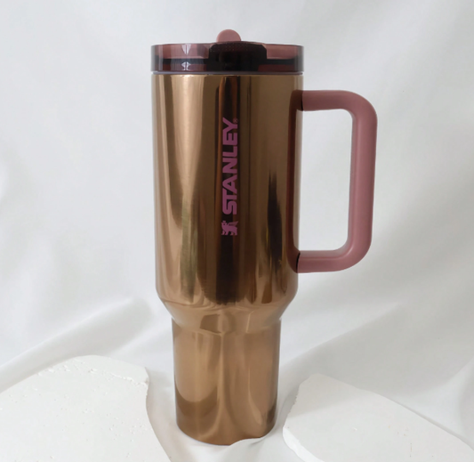 Stanley 40oz metallic bronze insulated tumbler with dusty pink handle